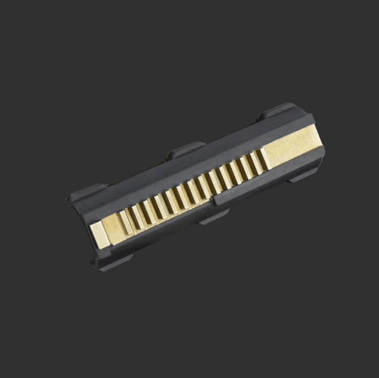 A close-up of a black and gold mechanical component with a ribbed central section against a dark background, ideal for the BlasterMasters 14 teeth CNC piston.